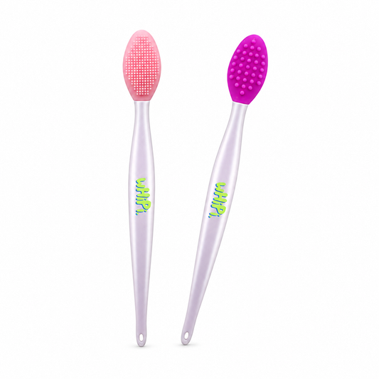 Set of two wHiPi silicone lip scrubbers with pink and purple textured tips on a white background.